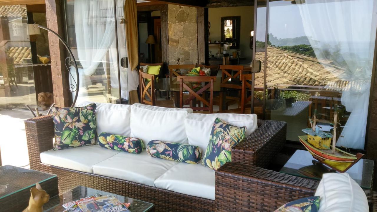Pousada Praia Joao Fernandes Armacao dos Buzios Exterior photo A rattan sofa